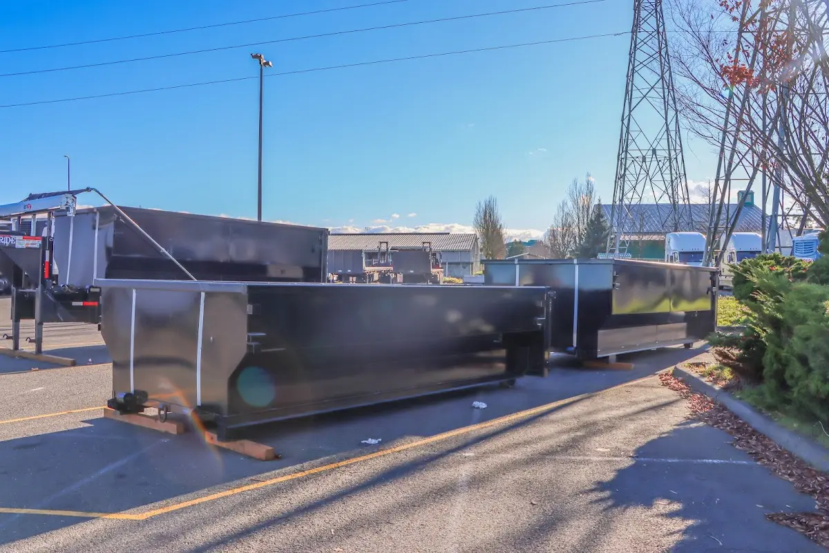Roll-off dumpster ready for waste disposal at job site for 3 Yard Dumpster Rental in Monessen